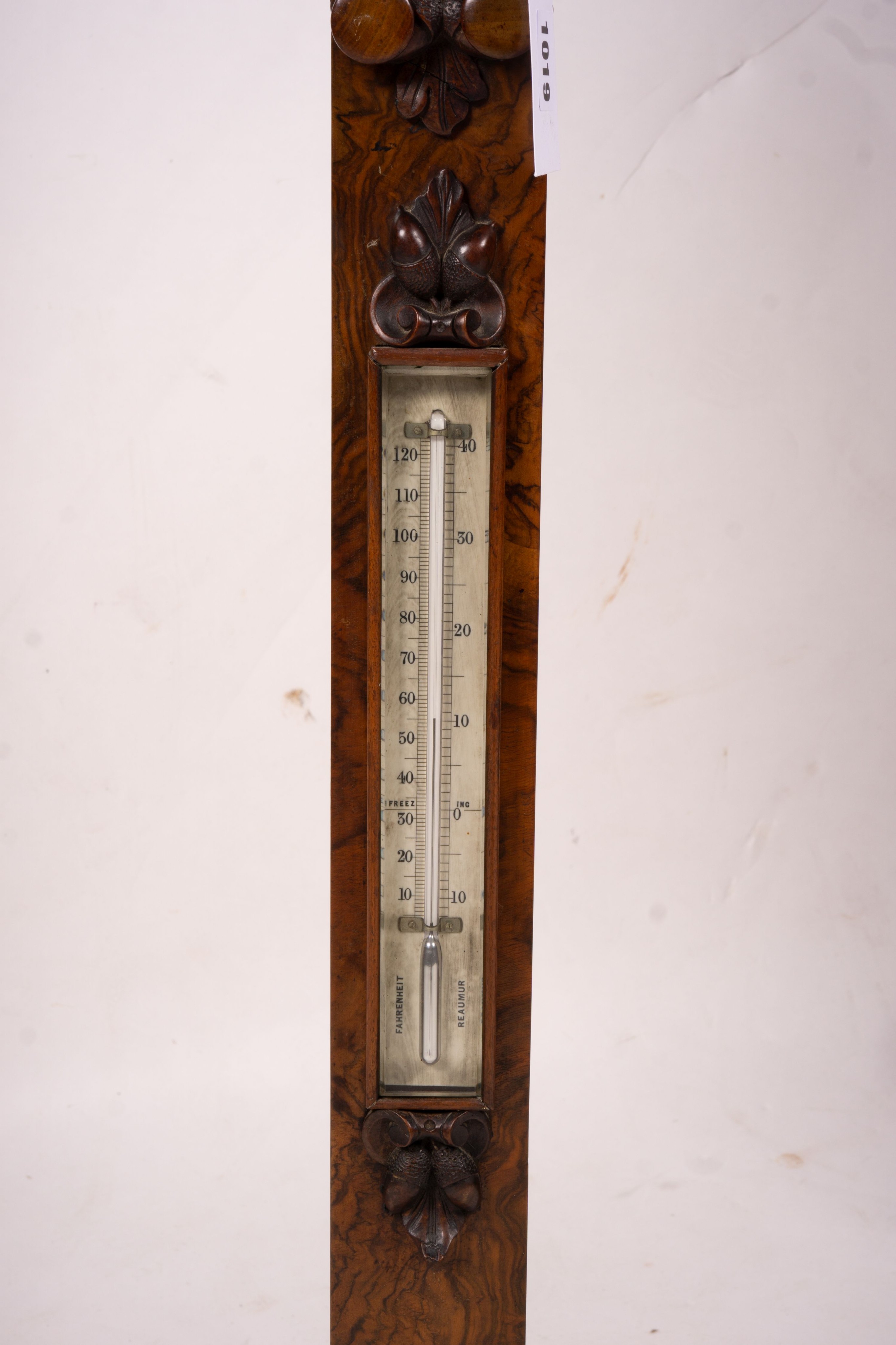 A Victorian carved walnut stick barometer by Chadburn Bros., Sheffield, height 104cm